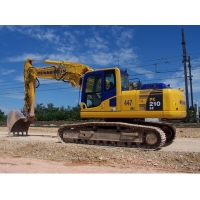 .   Komatsu 210.   